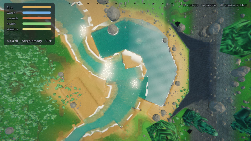A top-down view of the recovered backwater lake, a curved shoreline of turquoise water fed by a winding river